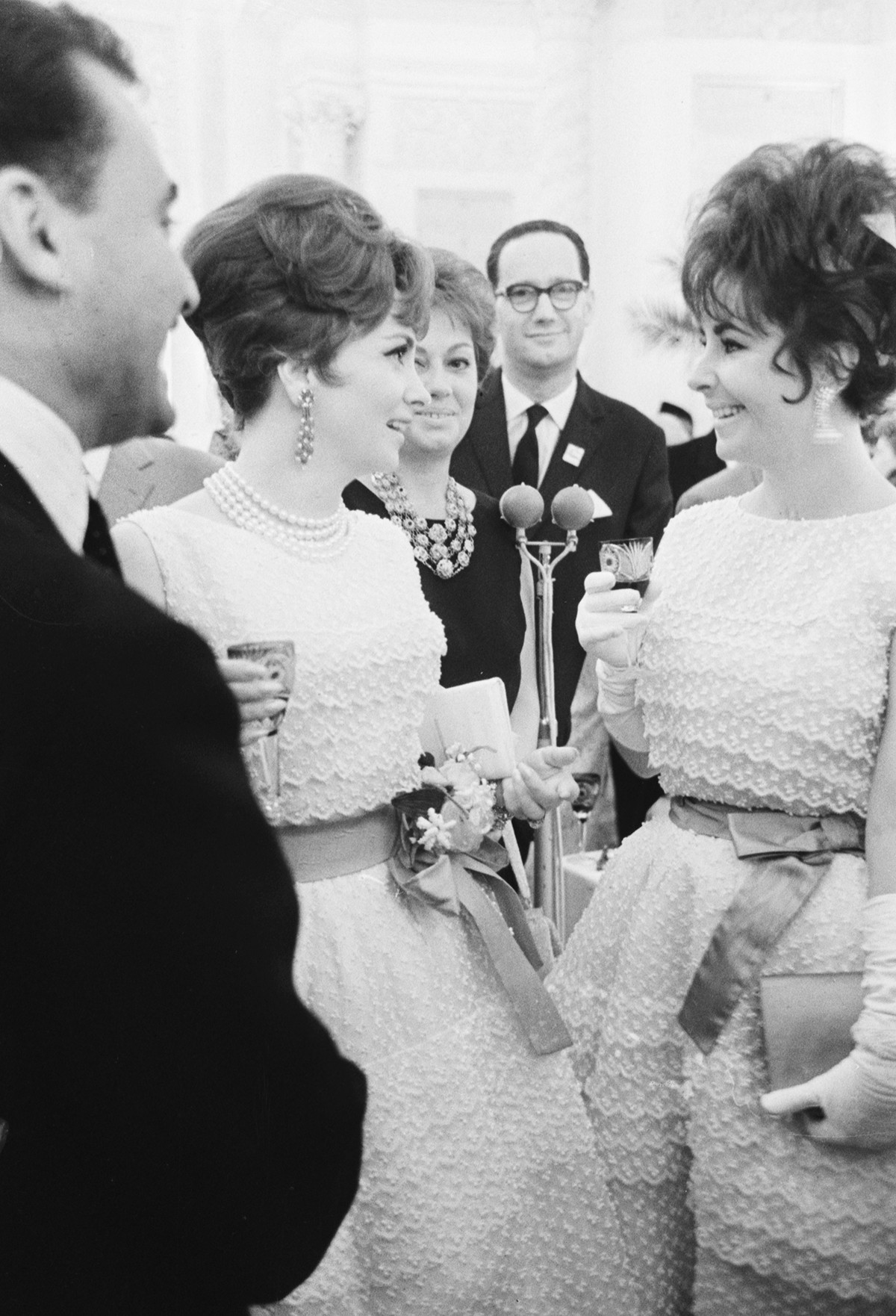 Elizabeth Taylor (R) and Gina Lollobrigida during a reception in the Grand Kremlin Palace at the 2nd Moscow International Film Festival, 1961