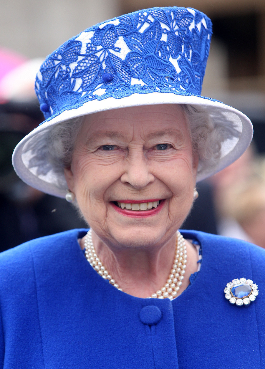 Краљица Елизабета II на забави у врту замка Балморал, 7. август 2012. Шкотска.