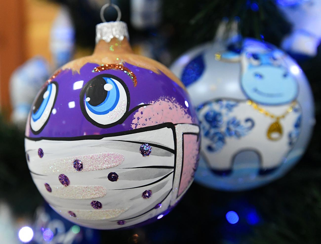 Christmas tree ornaments with masks from Krasnoyarsk.