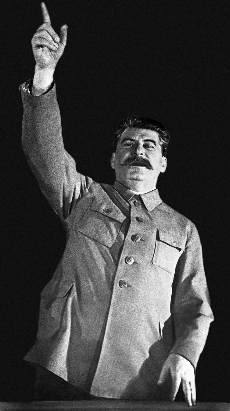 In the 1920s, Stalin was dressed in a quasi-military gray tunic with a stand-up collar and four pockets.