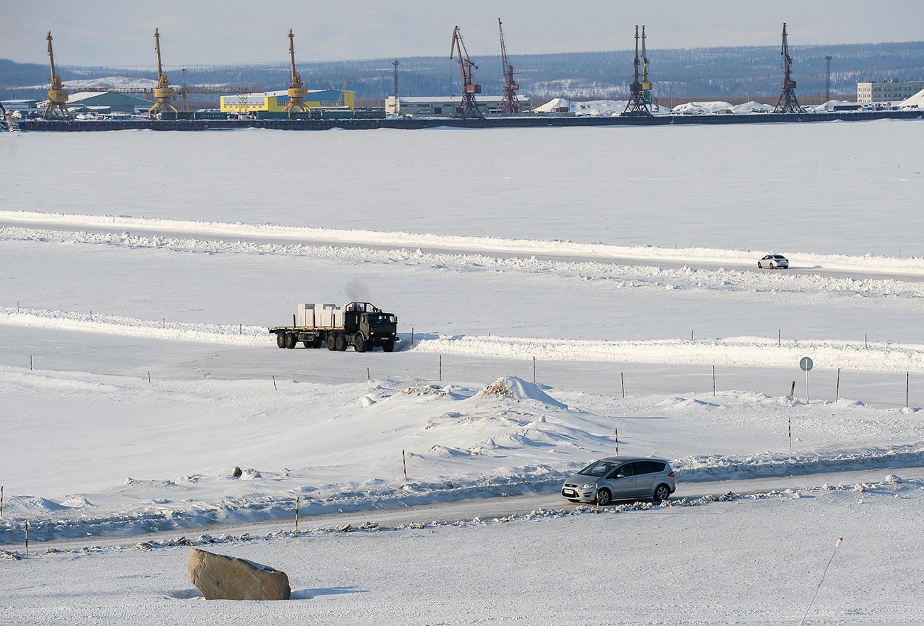 Crossing frozen Ob river.