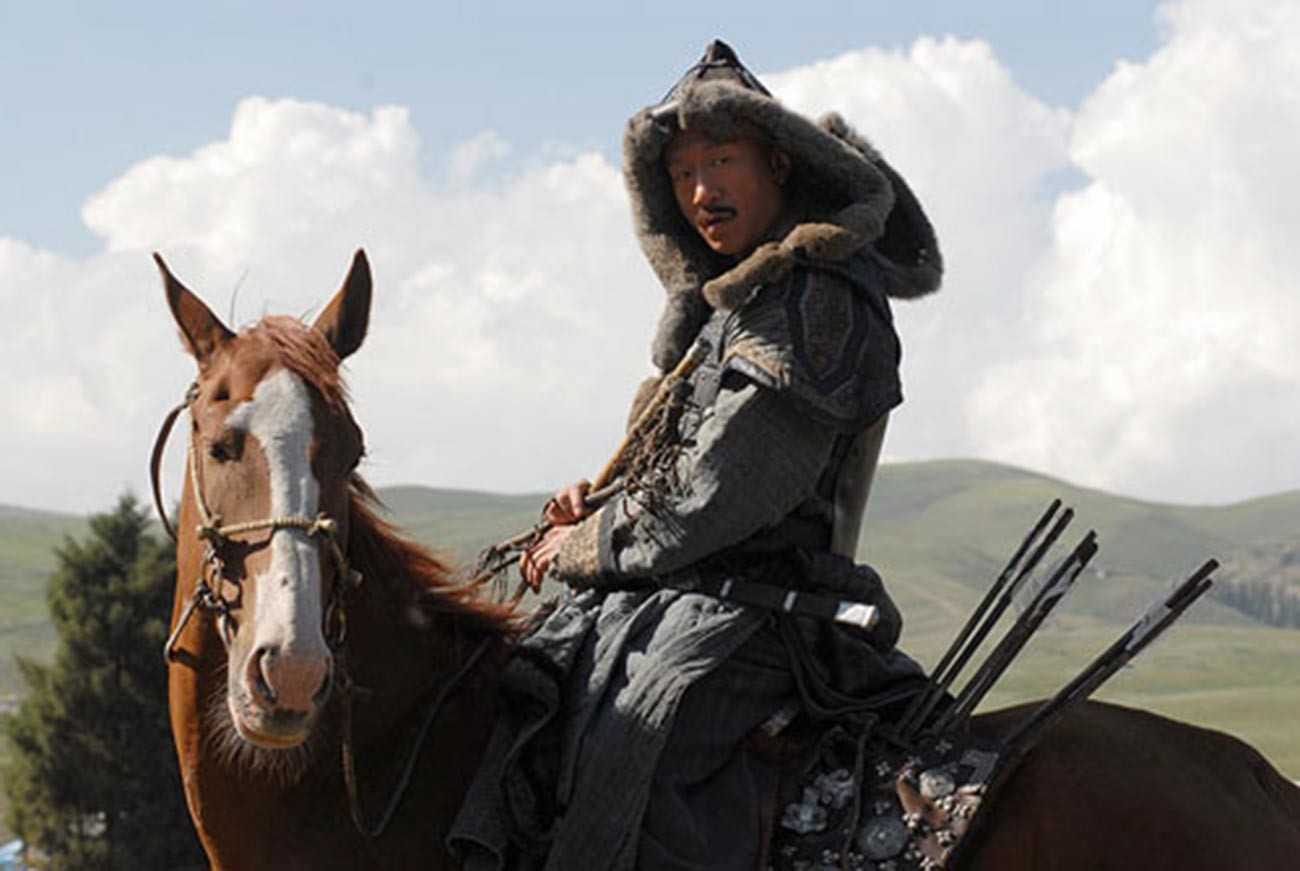 A still from 'Mongol' movie, 2007. A Mongol military commander is seen in a kind of shuba