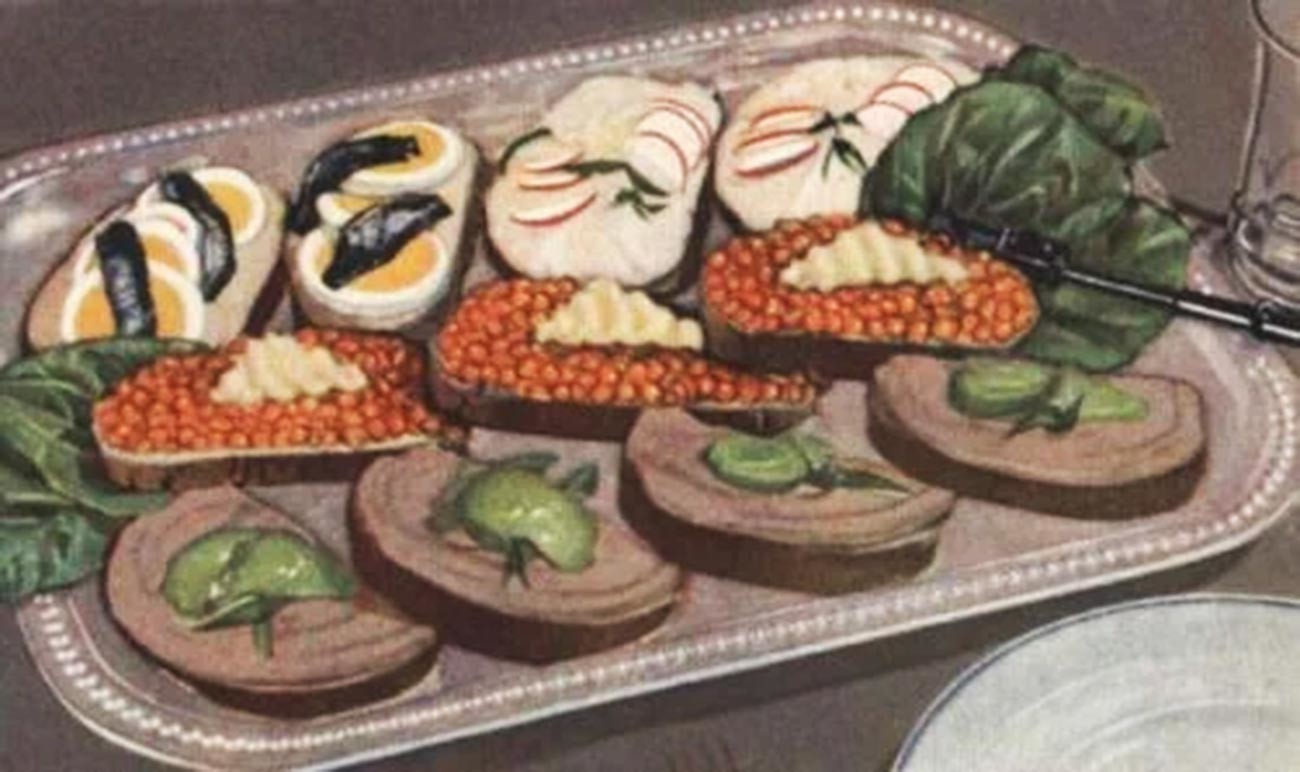 ソ連時時代の料理本「美味しくて健康的なごちそう」に掲載された、お祝いのテーブルに出されたブッターブロート