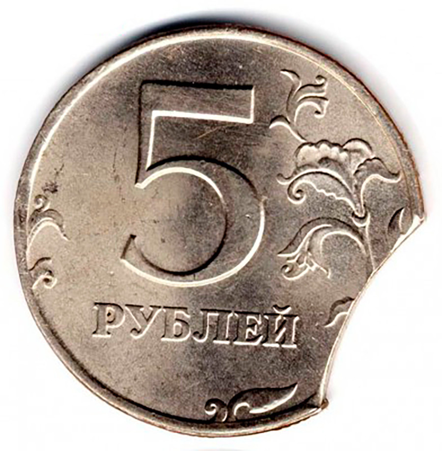 A coin with a missing part.