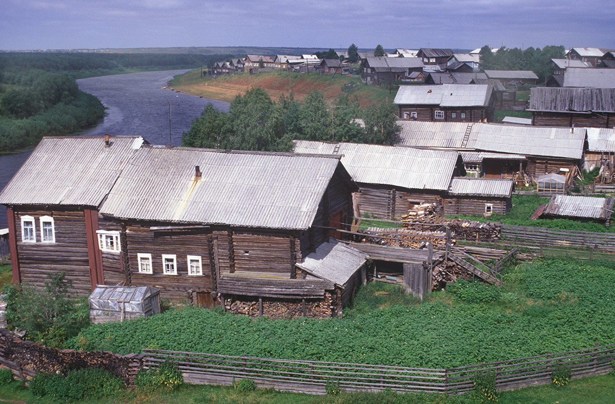 Kimzha village. View north from bell tower of Hodegetria Church. Left: house of Elena Safonova. Background: Kimzha River. August 1, 2000