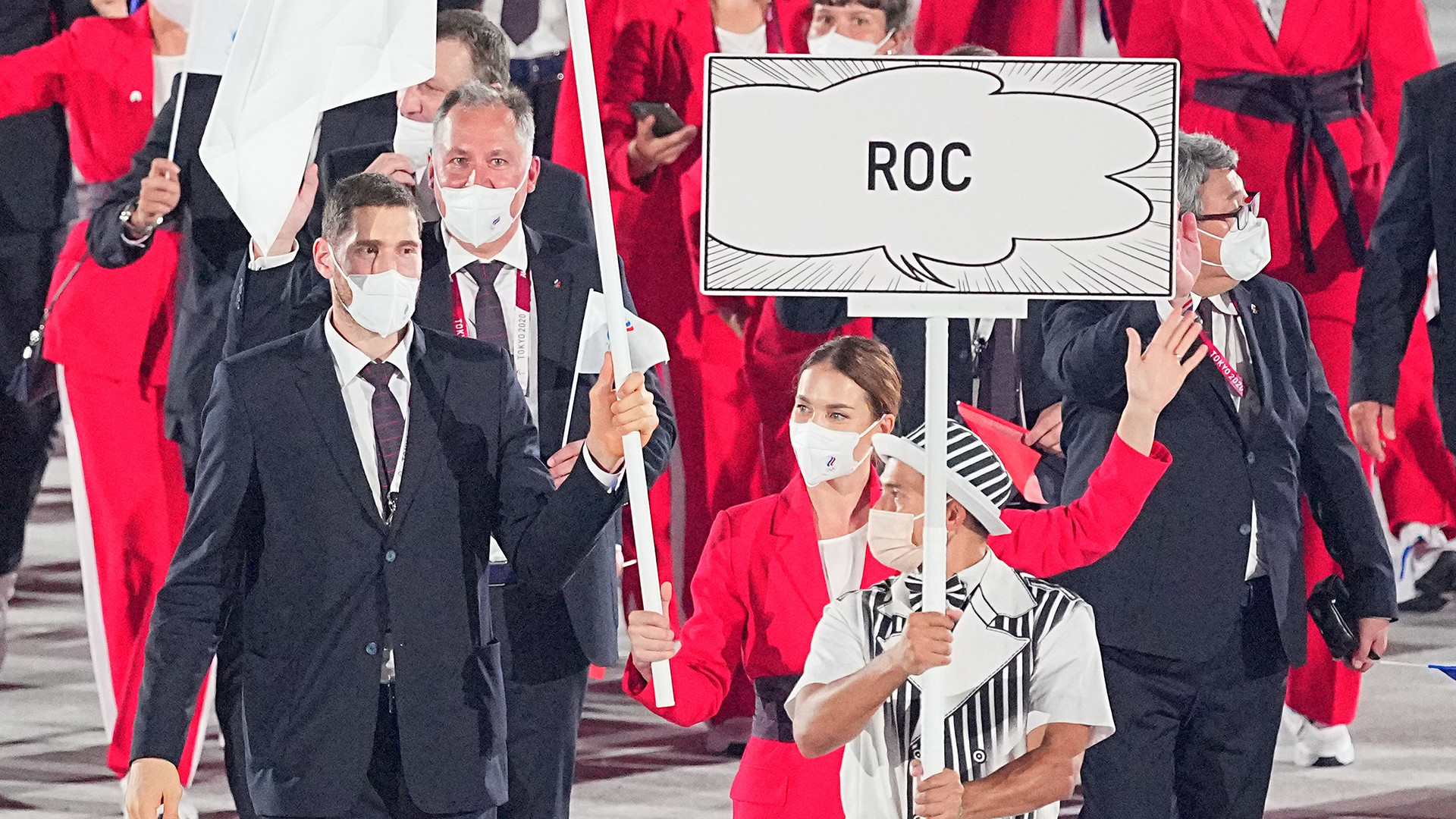 Opening Ceremony at the Olympic Stadium. The Russian Olympic Committee (ROC) team with flag bearers fencer Sofya Velikaya and volleyball player Maxim Mikhaylov enter the stadium