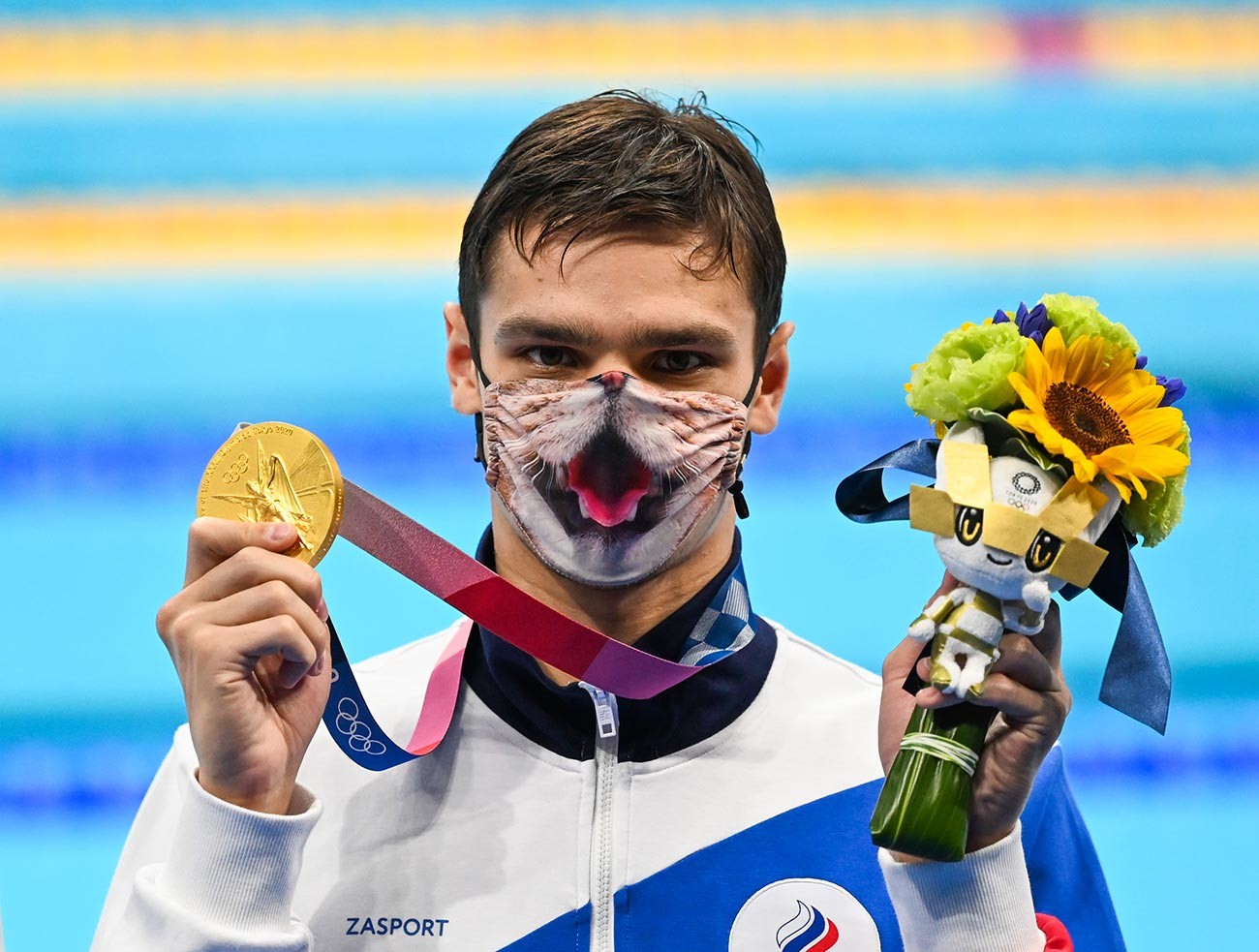 Evgeny Rylov of Team ROC poses with his gold medal for the Men's 200m Backstroke Final of swimming during the Tokyo 2020 Olympic Games at Tokyo Aquatics Centre in Tokyo, Japan on July 30, 2021