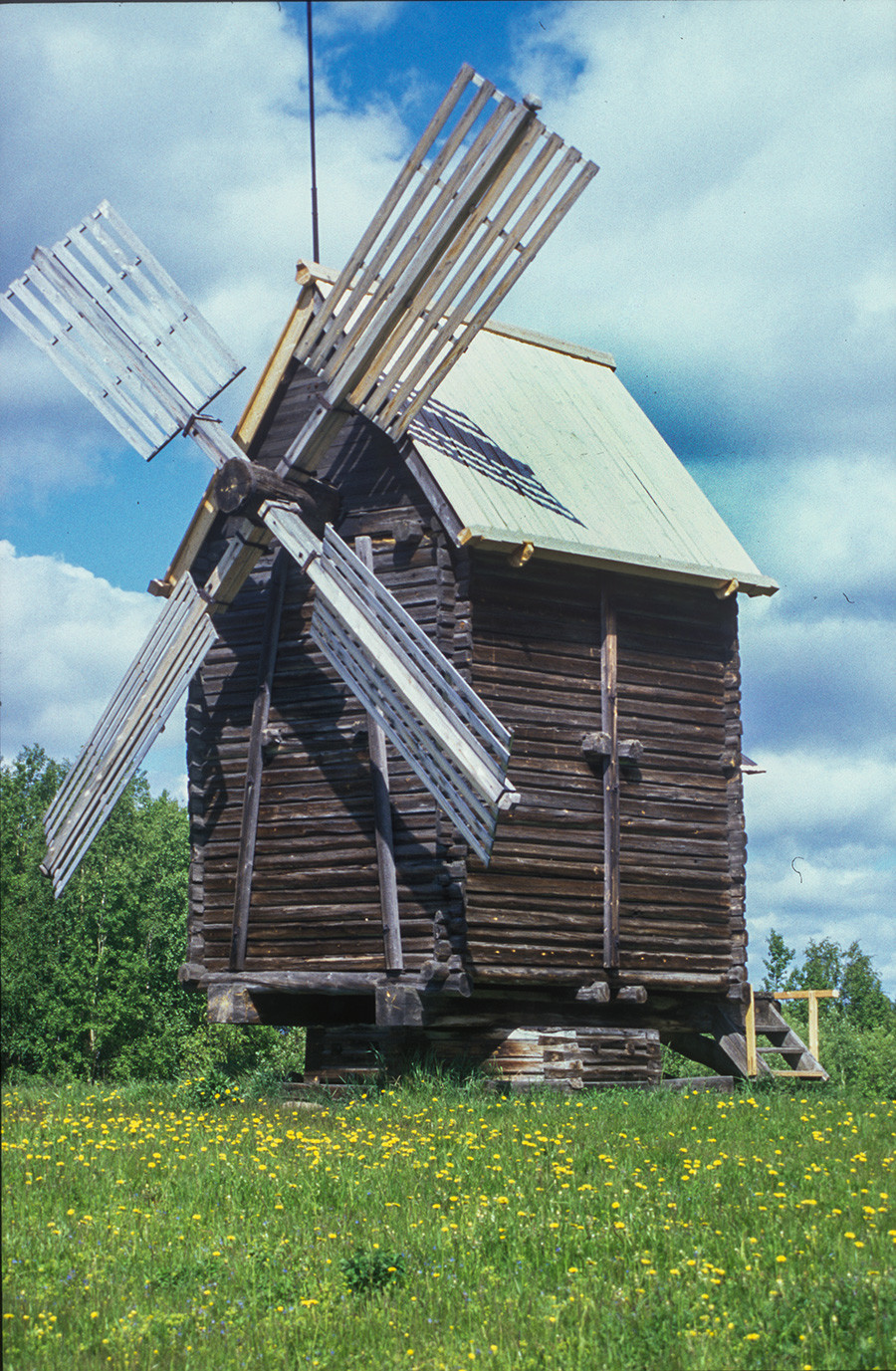  Malye Korely Museum. Post windmill originally at Kalgachikha village. Mill structure turns on low base. June 23, 2003
