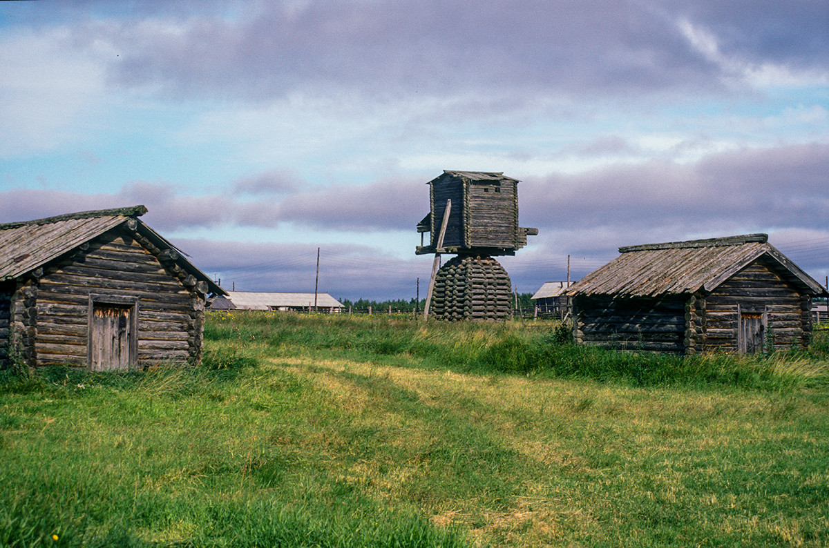 Kimzha (Mezen distict). Log barns & post windmill. August 2, 2000