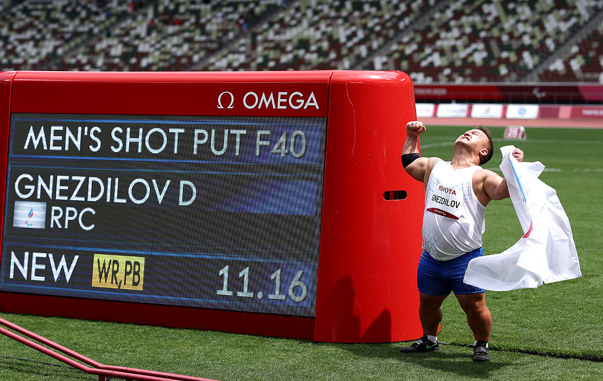 Denis Gnezdilov of Team Russian Paralympic Committee reacts after winning gold medal and breaking the World record in Men's Shot Put - F40 on day 5 of the Tokyo 2020 Paralympic Games at Olympic Stadium on August 29, 2021 in Tokyo, Japan