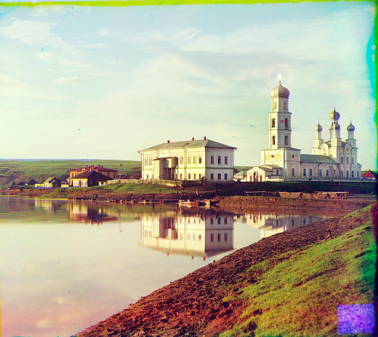 Upper Chusovskaya Gorodki (now submerged in Kama Reservoir). Church of the Nativity of Christ, southwest view. Foreground: early 18th-c. administrative building similar to Stroganov Chambers in Usolye. Summer 1912