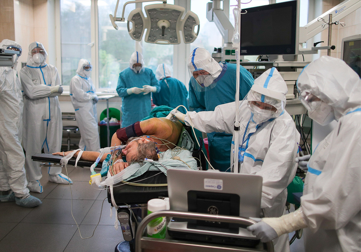 Staff members at work in the 'red zone' of a temporary medical facility established for COVID-19 patients at Moscow City Clinical Hospital No 15 (Filatov Hospital)