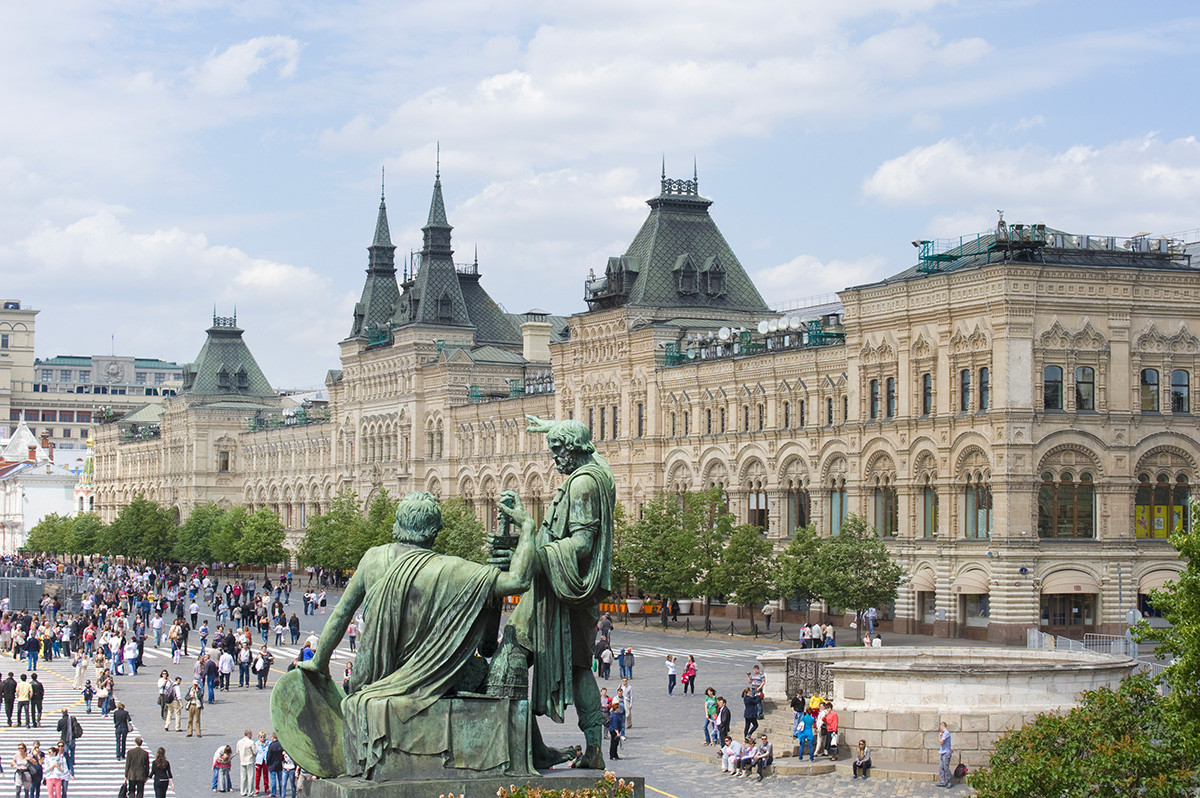 Red Square. View from St. Basil's terrace. Foreground: Statue of Dmitry Pozharsky & Kuzma Minin. Background: Upper Trading Rows (GUM) with Lobnoye Mesto (far right). June 2, 2012