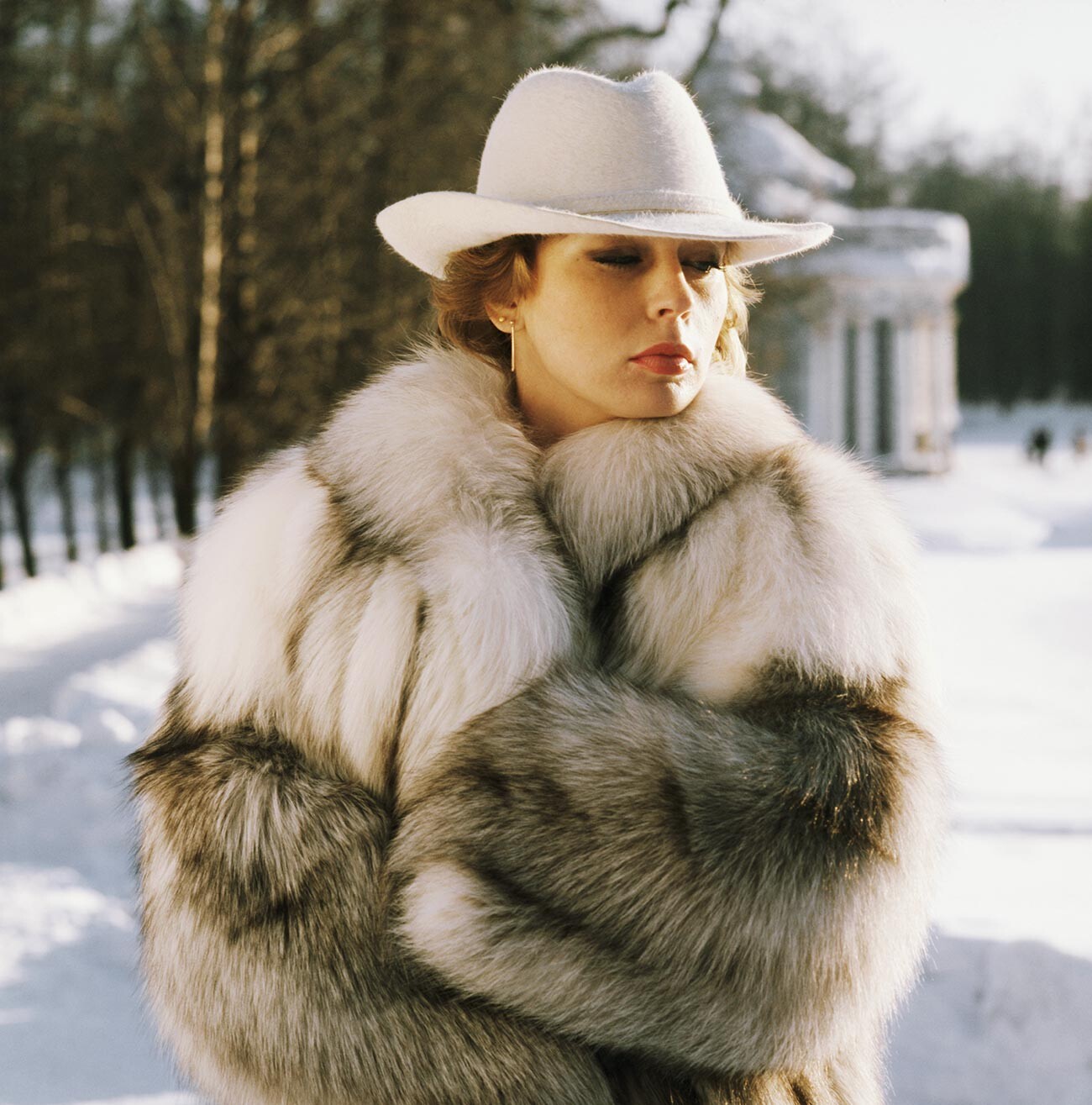A Soviet woman in a fur coat (shuba)