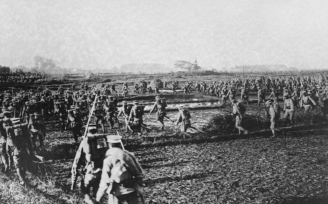 Japanese soldiers charge on Bolshevik positions in Siberia, 1920.