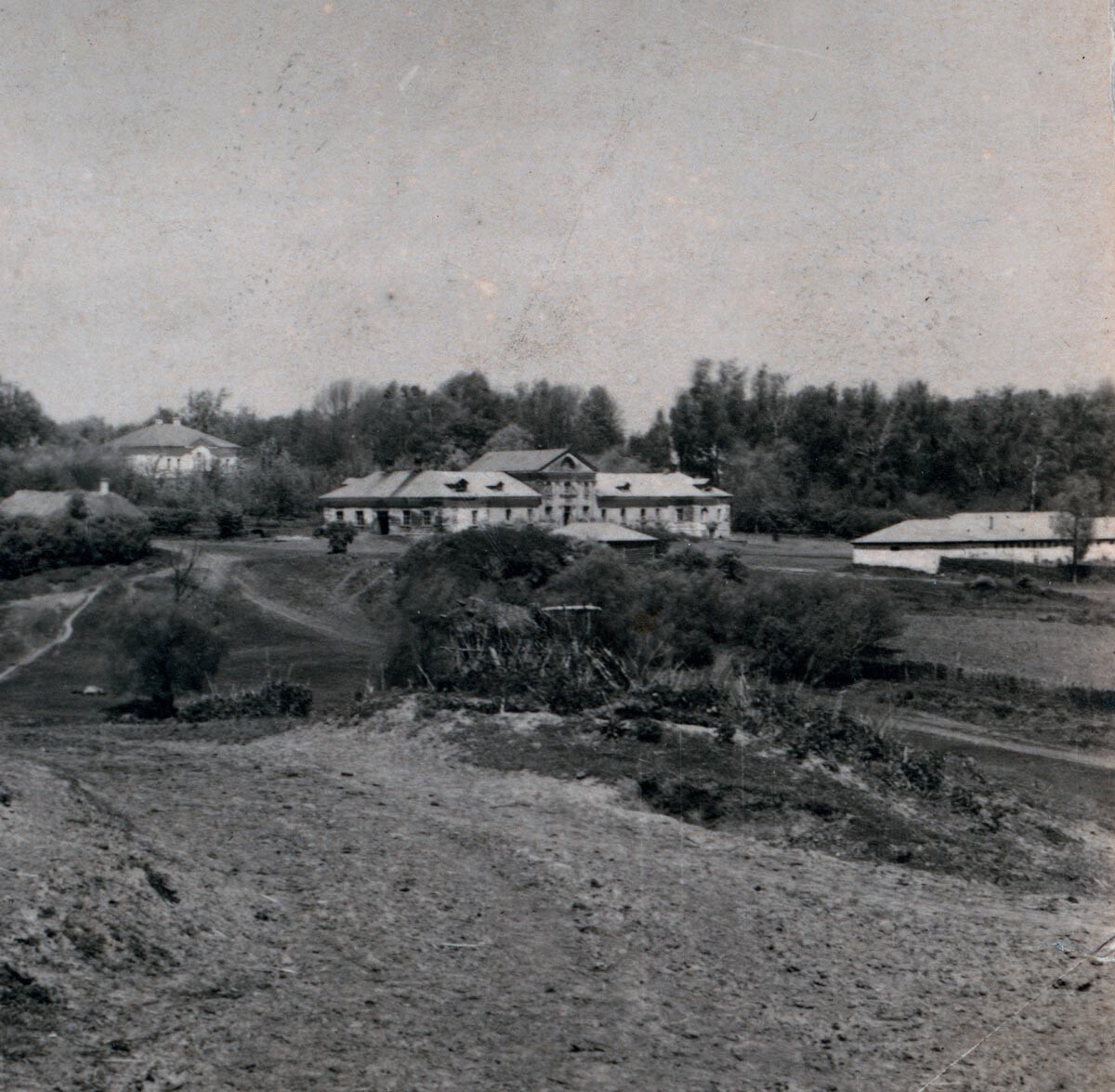 Yasnaya Polyana. From left: Kuzminsky wing, Volkonsky house, stables. Contact print (original glass negative not extant). May, 1908 