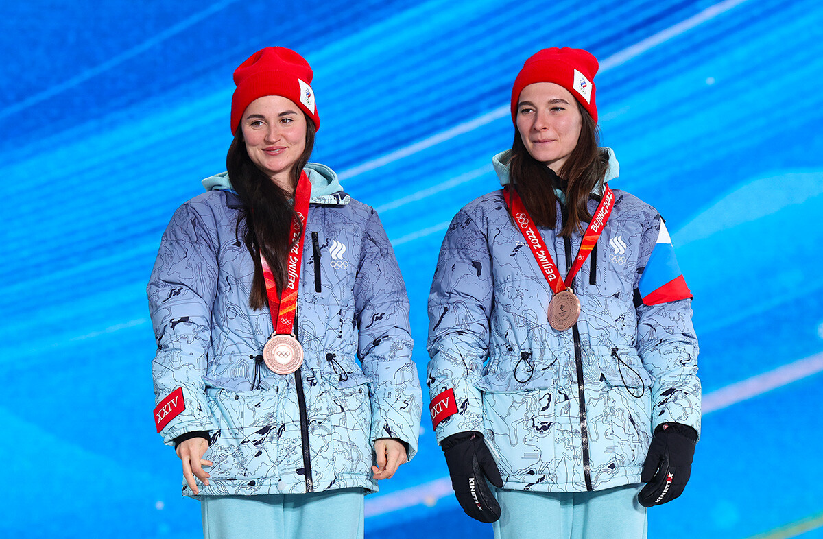Bronze medallists Yuliya Stupak (left) and Natalya Nepryaeva during the Women's Team Sprint Classic medal ceremony.