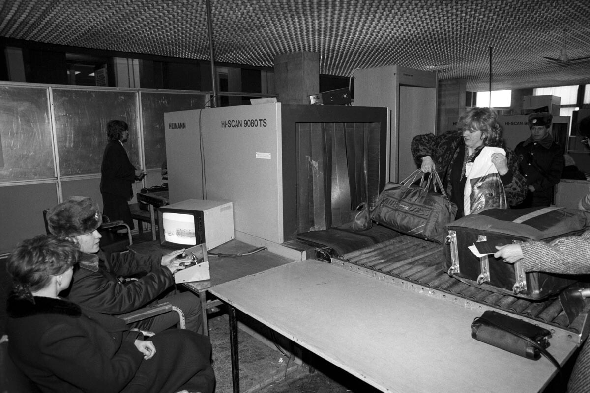 Checking passengers' luggage at Vnukovo Airport, 1991