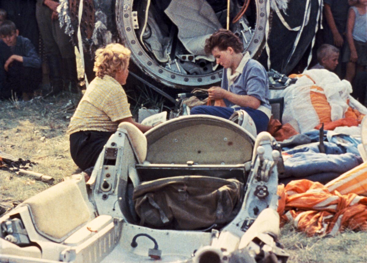 Cosmonaut Valentina Tereshkova outside of the Vostok 6 space capsule after landing, june 1963