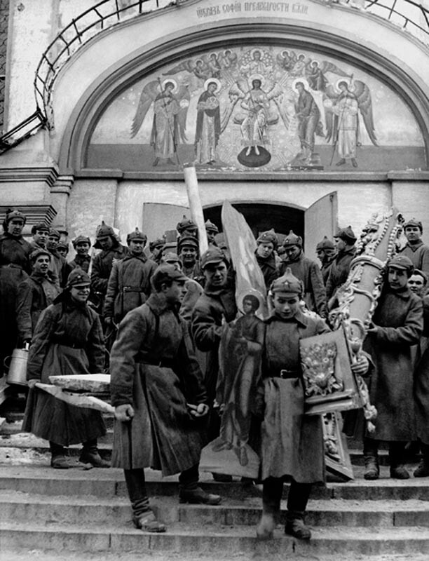 Red Army soldiers take out icons and church items from the Simonov Monastery, 1923