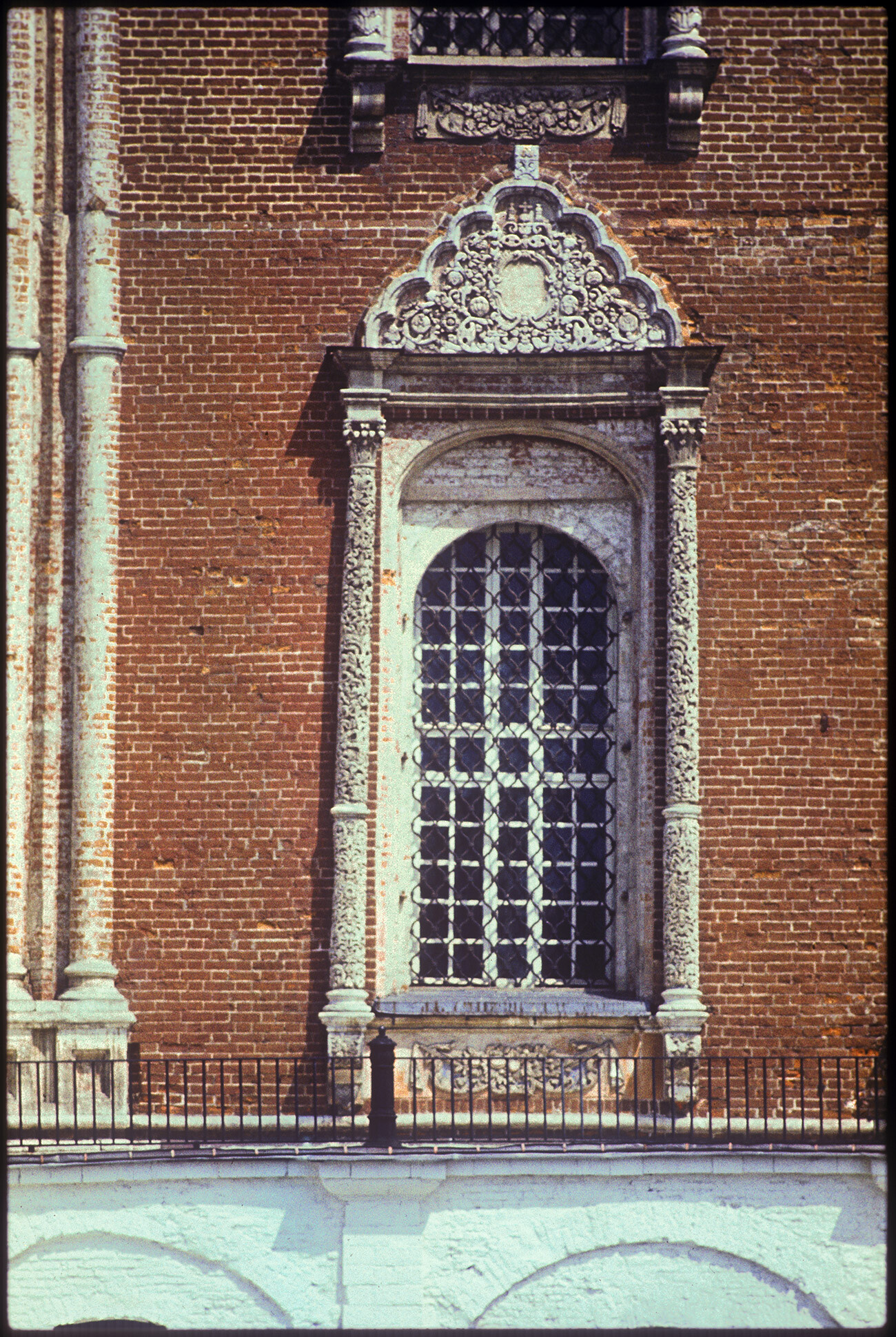 Ryazan Kremlin. Cathedral of the Dormition of the Virgin. West facade, window with carved limestone decoration. May 13, 1984