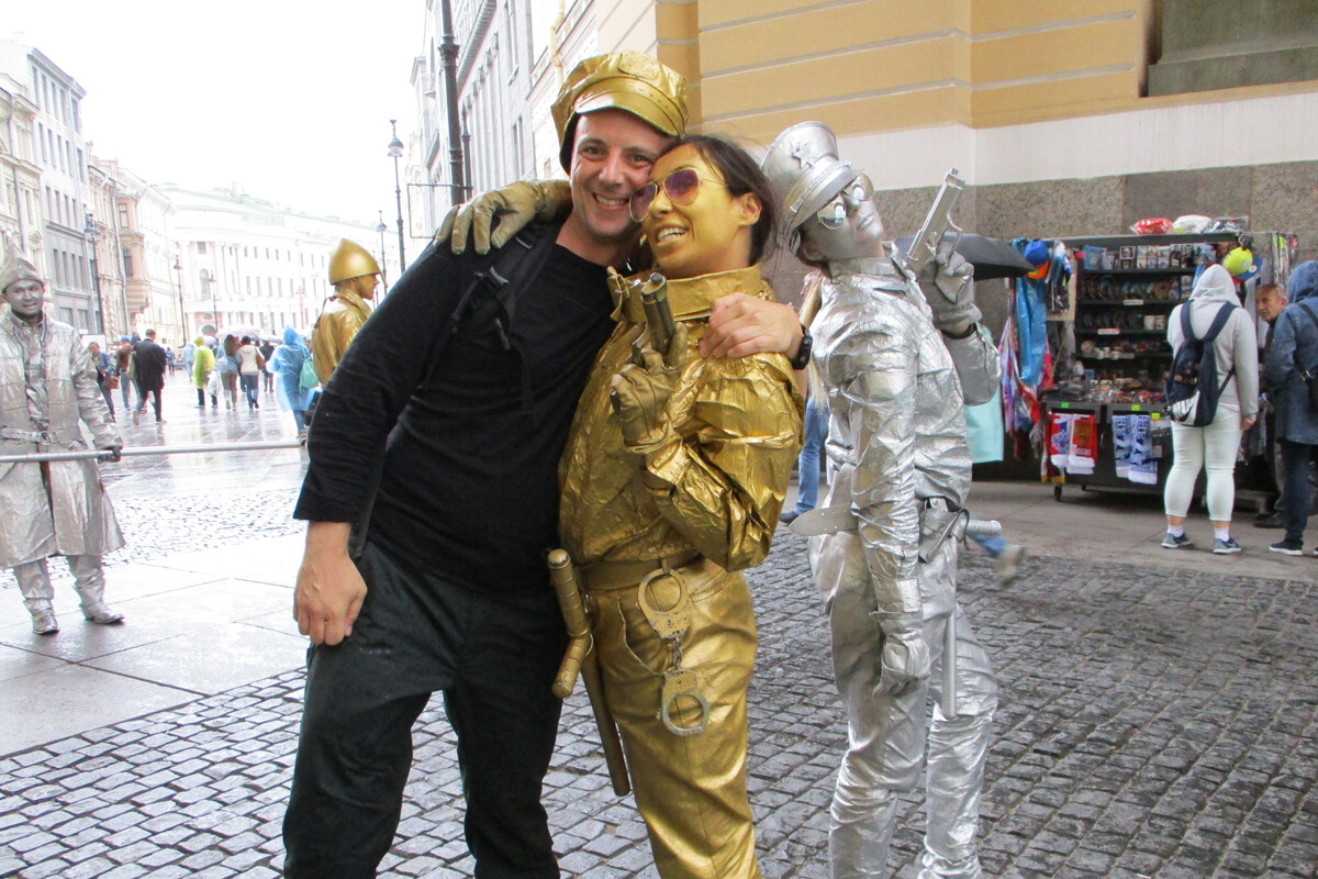 With a street performer at Palace Square.