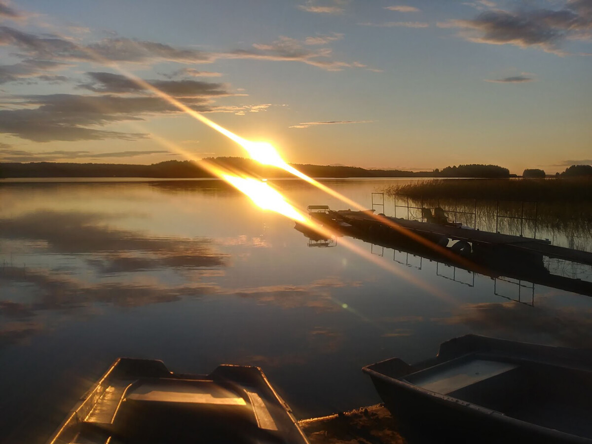 Evening sunset on the lakes of Karelia, August 2021