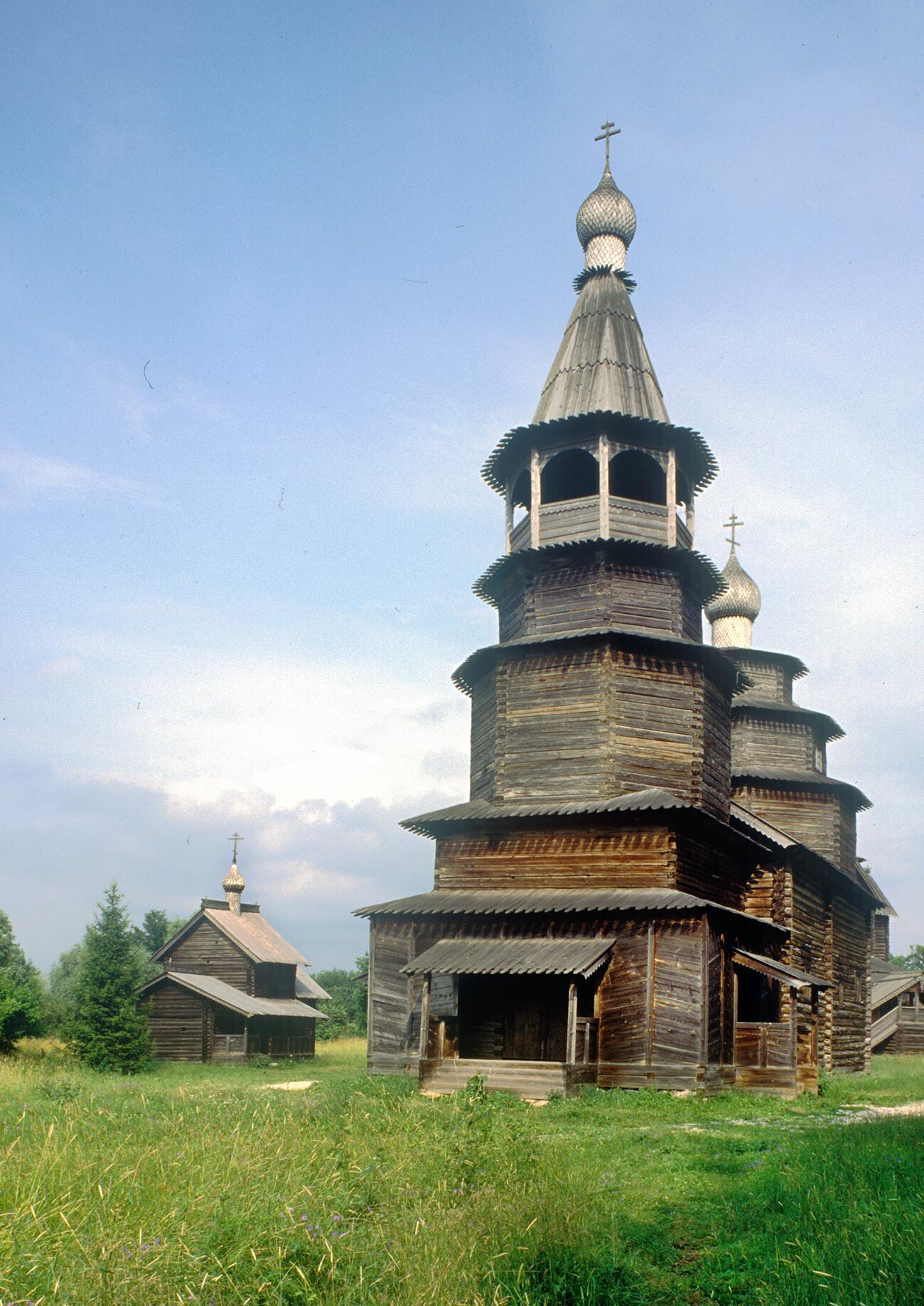 Vitoslavlitsy. Church of St. Nicholas from the village of Vysoky Ostrov. West view with bell tower. July 5, 1995