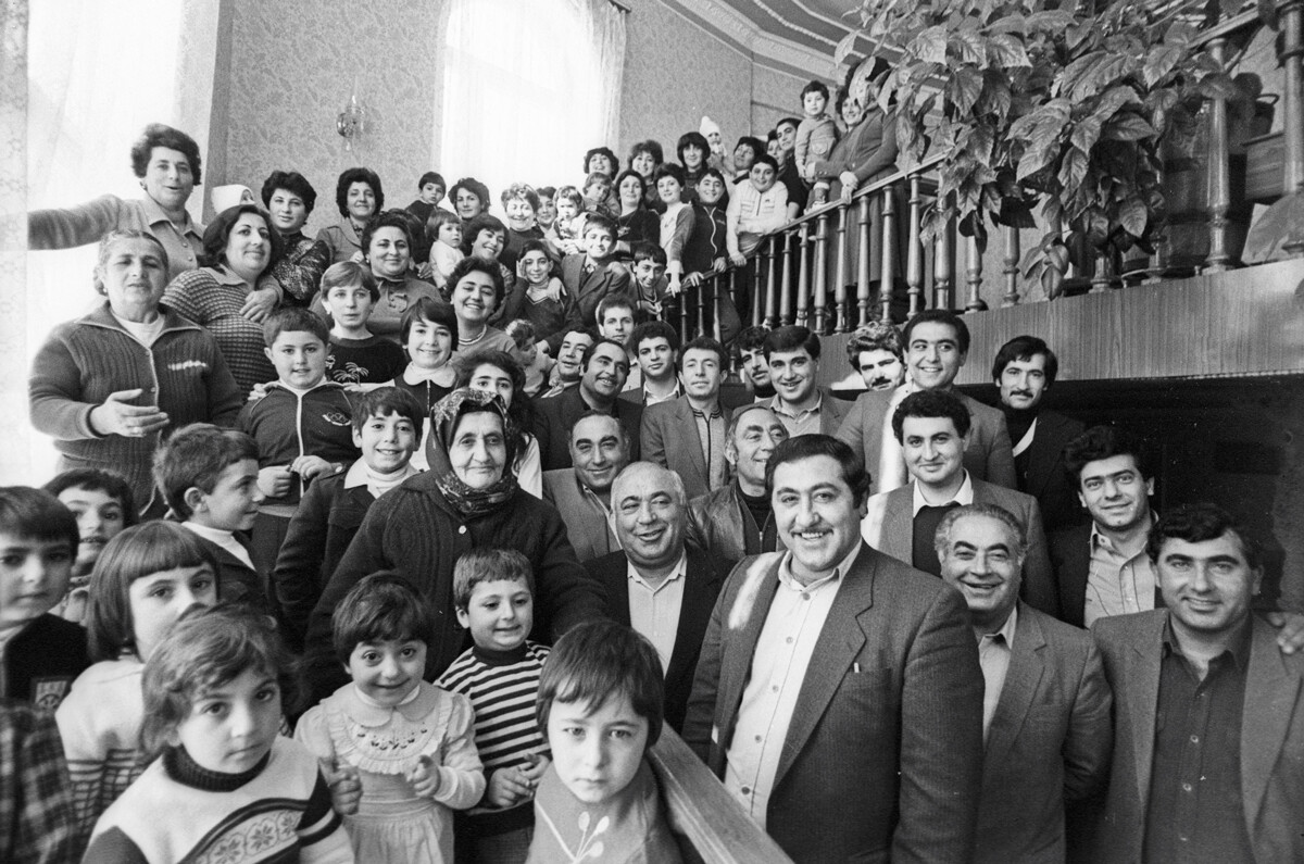 Mother-Heroine Bavakan Akopyan (2nd row, center) and her large family. Armenian Soviet Socialist Republic.