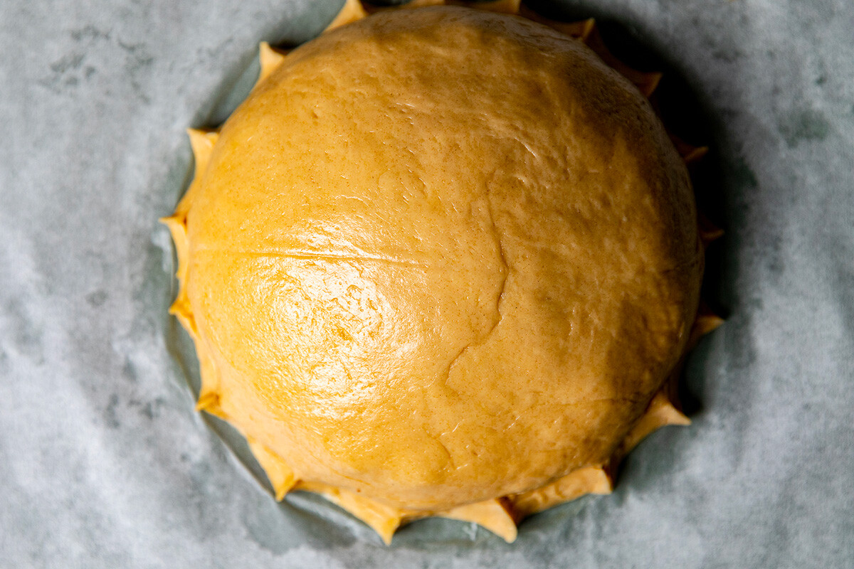 Traditional Russian pancakes pie - kurnik. Stock Photo