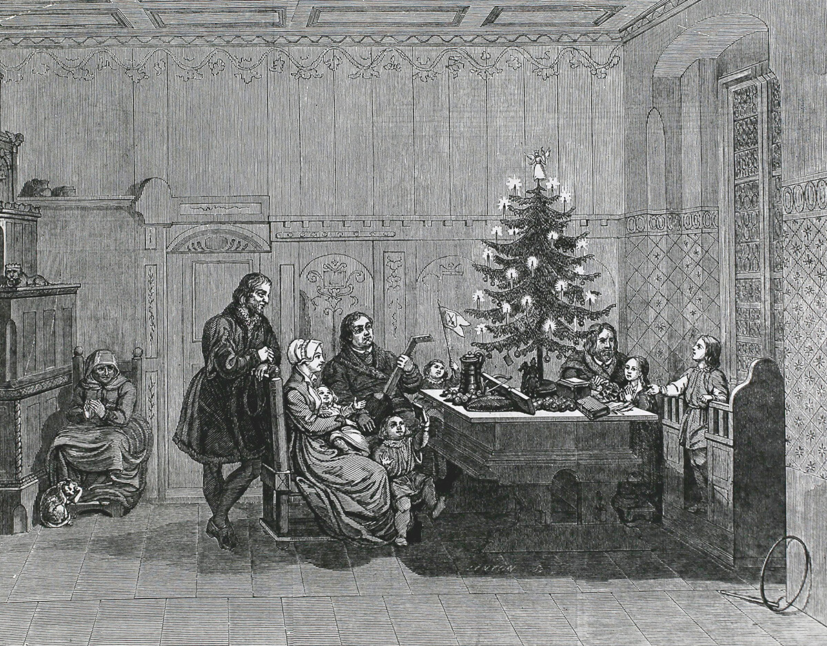 Heiligabend in Deutschland. Martin Luther und seine Familie. Radierung aus dem 19. Jahrhundert.
