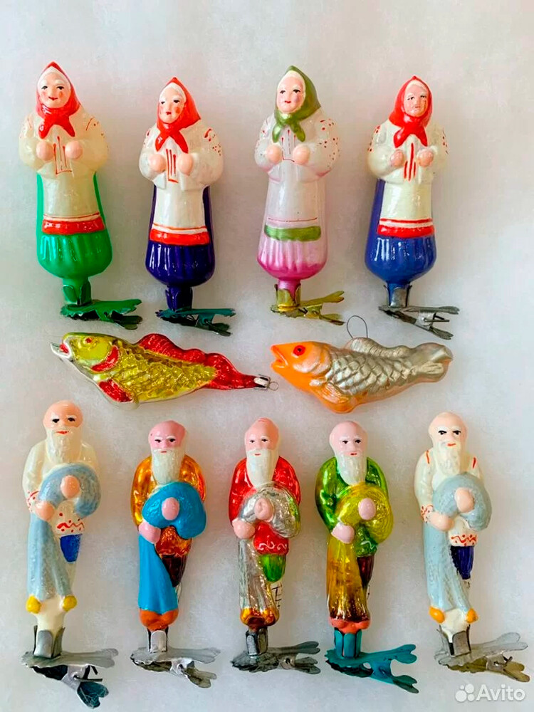 Tree toys depicting characters of Pushkin's fairy tail 'The tale of the Fisherman and the Fish'.