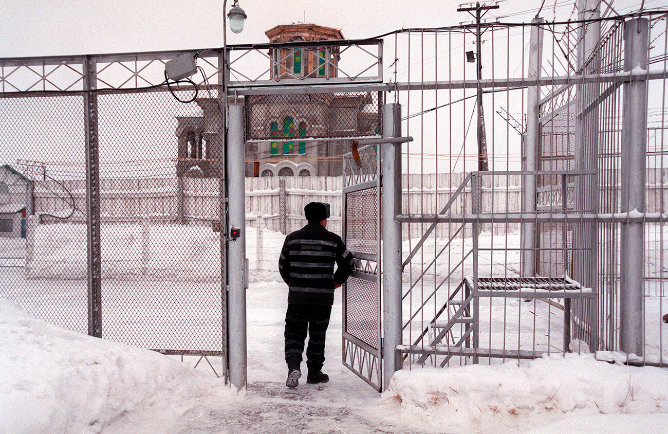 A prisoner passes through the gates of a prison in Harp on the Yamal peninsula in the far north of Russia in this undated picture.