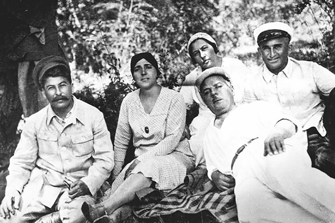 Joseph Stalin, his second wife Nadezhda Alliluyeva, Kliment Voroshilov with his wife Ekaterina, and Avel Enukidze.