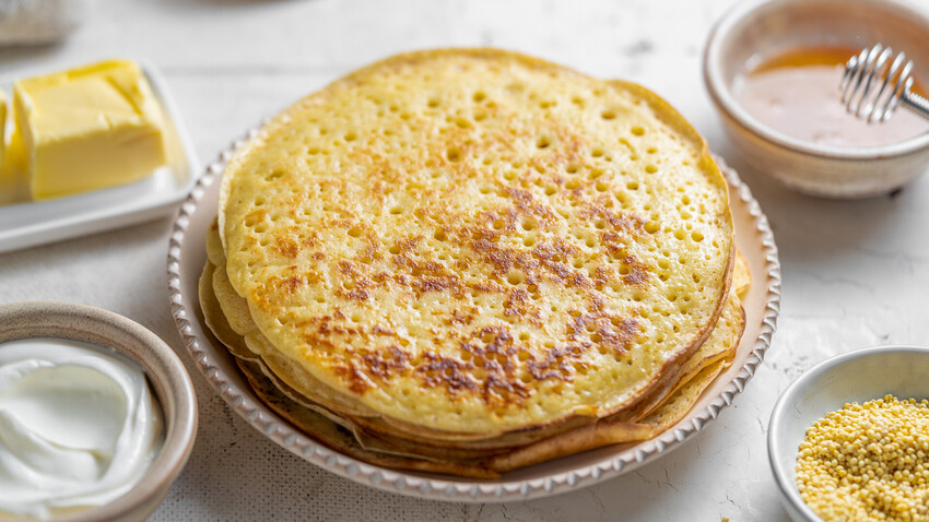 These yellow spongy pancakes resemble the spring sun, and are ideal for Shrovetide celebrations.