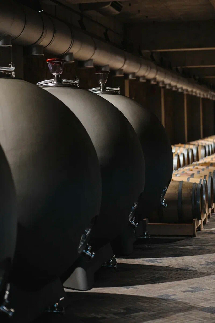 Concrete spheres help the wine proceed through the sediment mixing in a natural way.