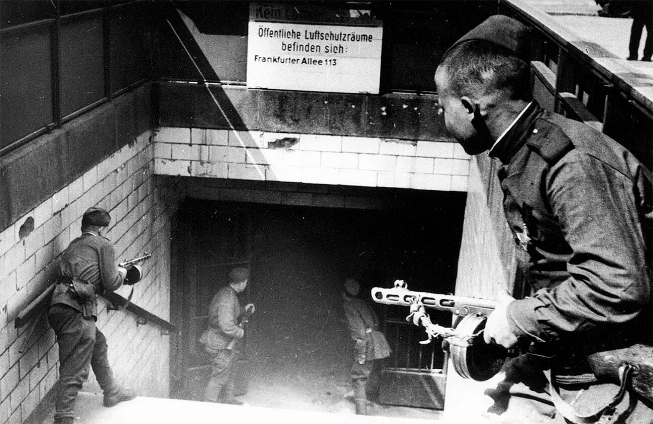 Soviet  soldiers enter the Frankfurter Allee railway station.