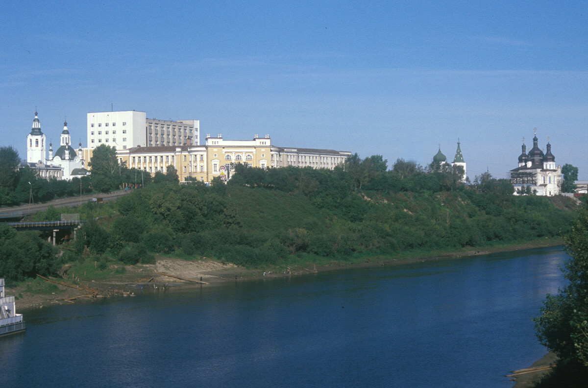 Tyumen. View up the Tura River. From left: Church of the Elevation of the Cross, School of Commerce, Trinity Monastery with Church of Sts. Peter and Paul and Trinity Cathedral. September 4, 1999