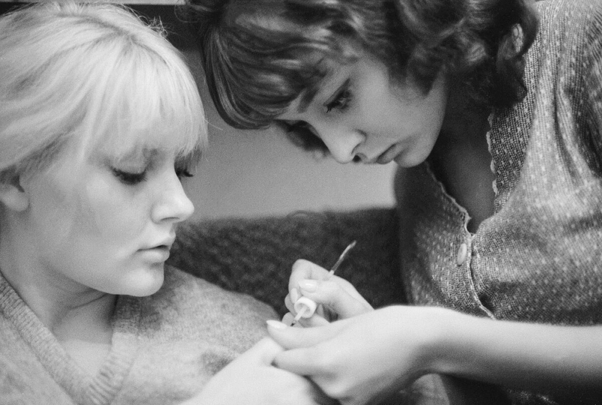 Students of the Shchukin Theatre College of Higher education, sisters Marianna and Anastasiya Vertinsky are making nails, 1964. 