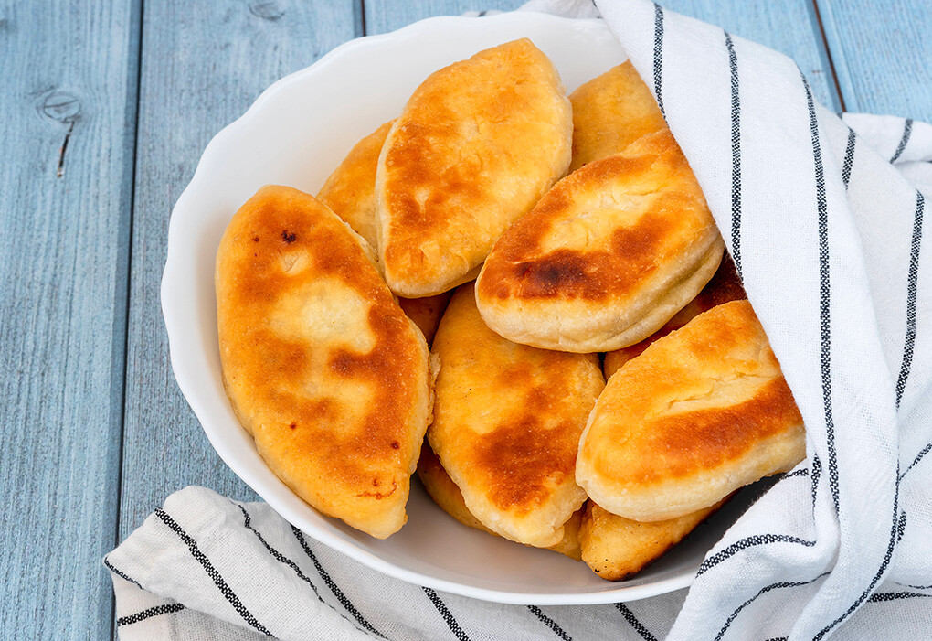 A favorite Russian comfort food is filled pies, which can be made either big or small and stuffed with a wide variety of fillings.