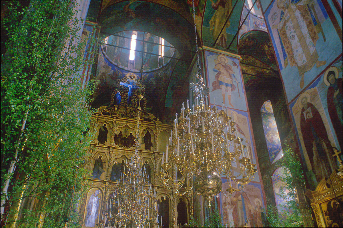 Trinity-St. Sergius Monastery. Dormition Cathedral. Interior decorated with birch boughs in preparation for Trinity Day (Descent of Holy Spirit, 50 days after Easter). Green boughs symbolize resurrection. May 29, 1999