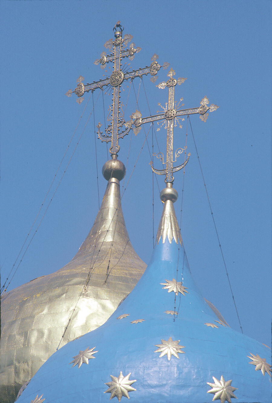 Trinity-St. Sergius Monastery. Dormition Cathedral, cupolas & crosses, southwest view. June 3, 1992