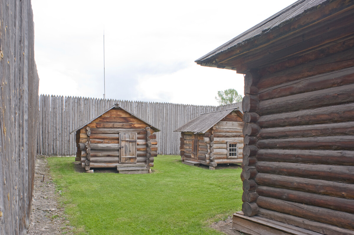 Shushenskoe Preserve. Recreated stockade (1969) with jail behind  District administration building. May 26, 2015