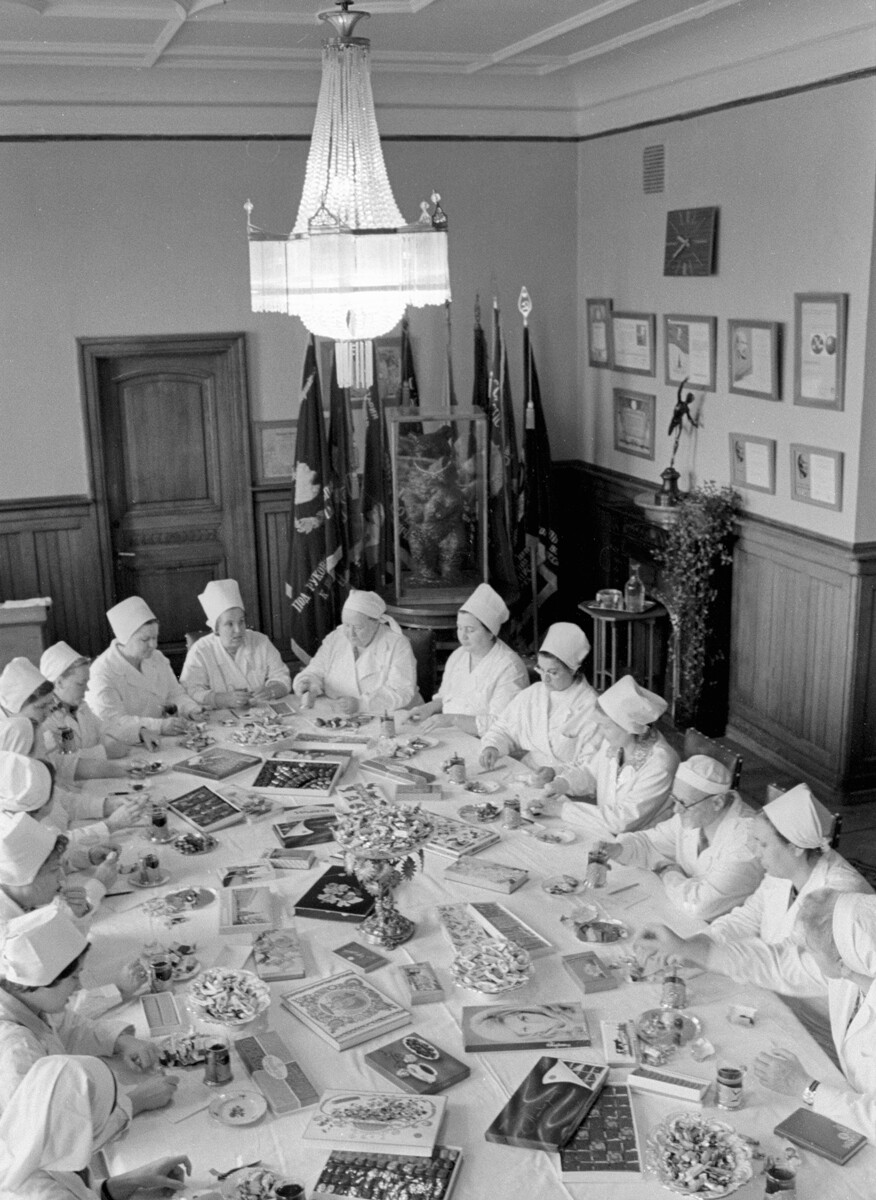 Members of the tasting council of the Krasny Oktyabr confectionery factory are testing new products, 1978.