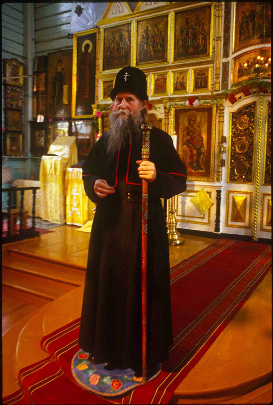 Old Believer Church of the Dormition. Historic photograph of Metropolitan Alimpy (Gusev), spiritual leader of Russian Orthodox Old Believer Church. Photograph taken with the blessing of the prelate, who is standing in front of icon screen. September 27, 1999