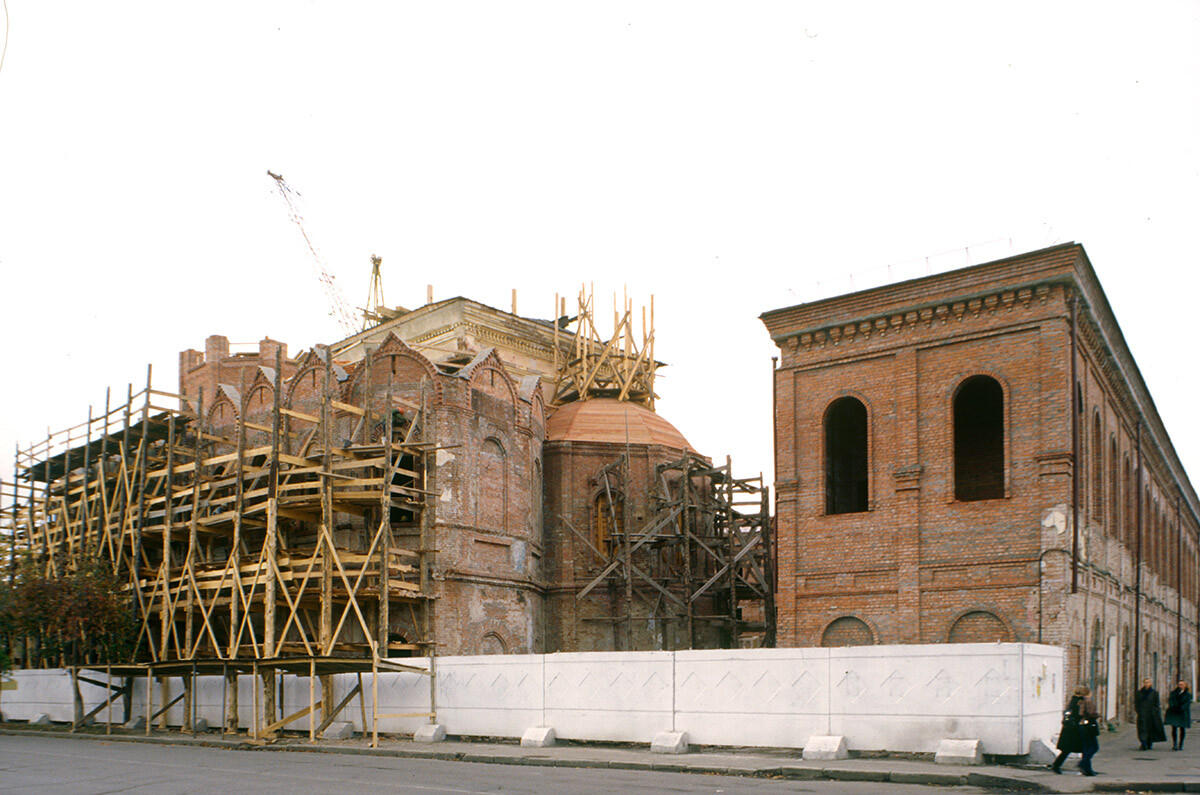 Epiphany Cathedral, southeast view. Built in 1777-84; expanded in 19th century; severely deformed in Soviet period for use as factory. This historic photograph shows the process of restoration, completed in 2002. September 25, 1999