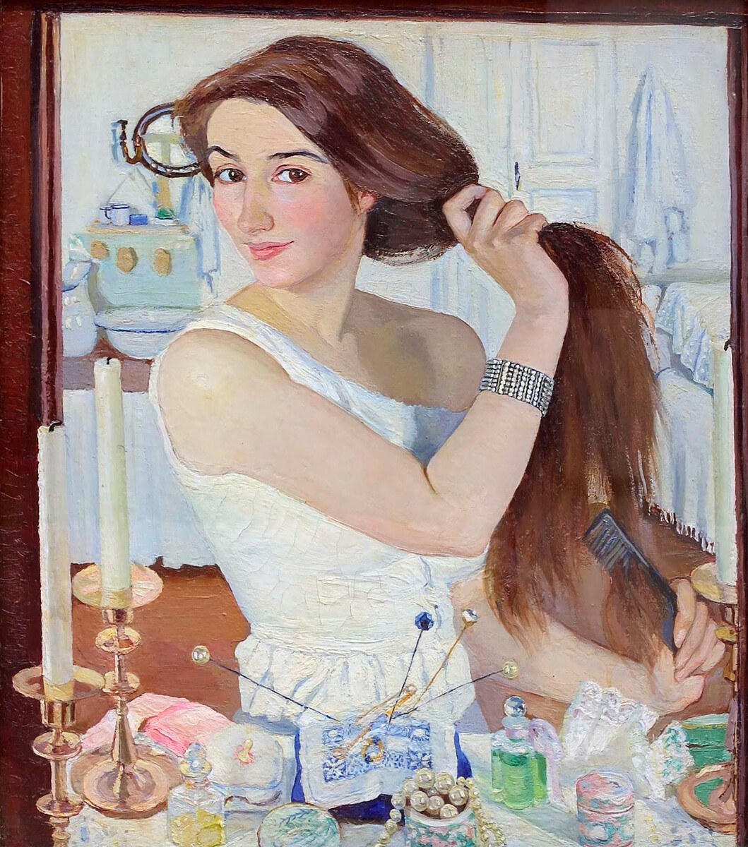 “Alla toiletta. Autoritratto”, dipinto del 1909 della pittrice Zinaida Serebrjakova (1884-1967)