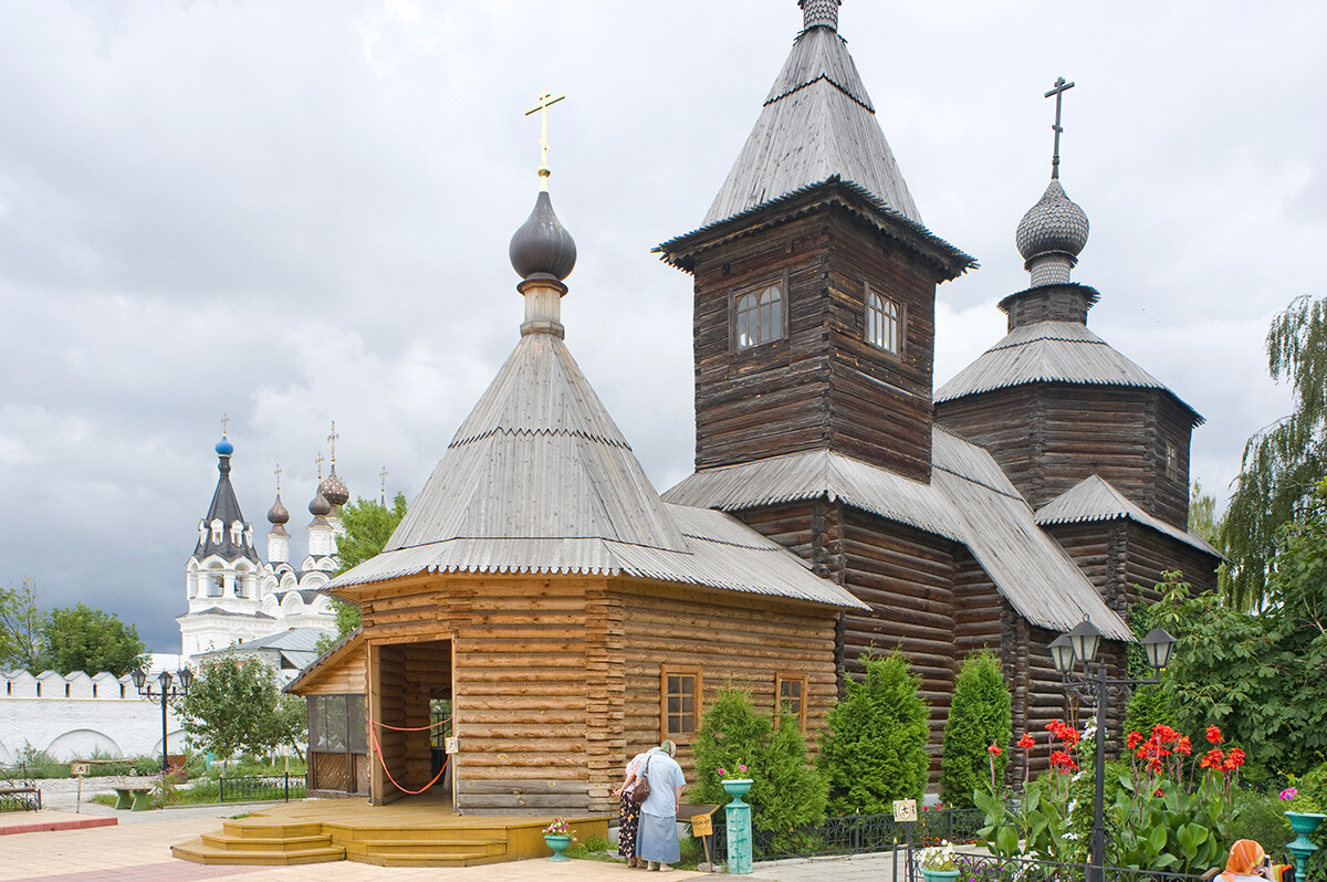 Trinity Convent. Log Church of St. Sergius of Radonezh, southwest view. Built in early 18th century, moved from village of Krasnoye to convent in 1970s. August 16, 2012