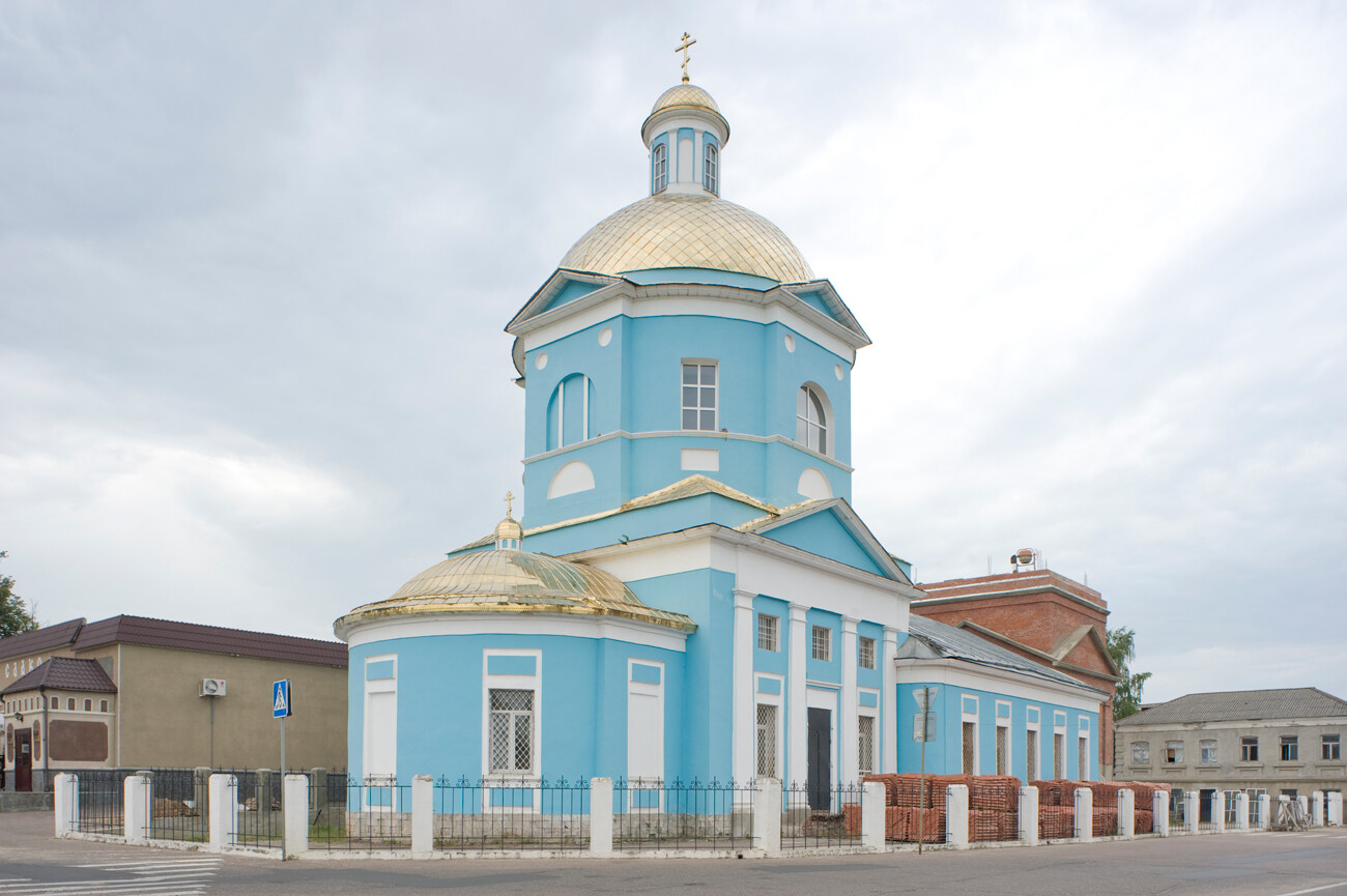 Church of the Ascension, northeast view. Built in a simplified neoclassical style from 1826 to 1840s. This view shows early phase of rebuilding the mid-19th century bell tower, razed in the Soviet period and completed in 2016. August 4, 2012