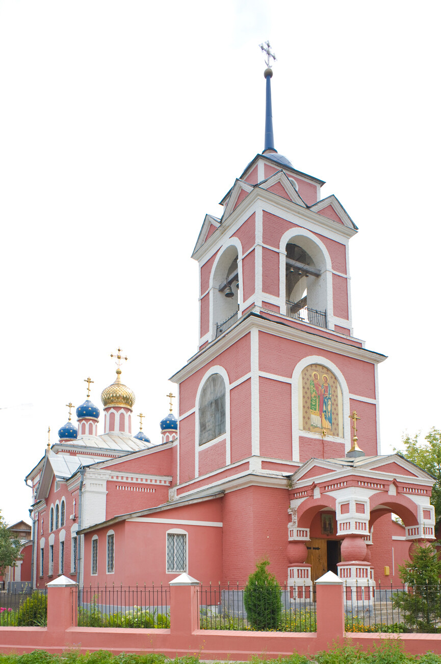 Church of Sts. Florus & Laurus, northwest view. Originally built in 1776 and rebuilt in phases from 1840s to 1869 when the bell tower was completed. August 4, 2012